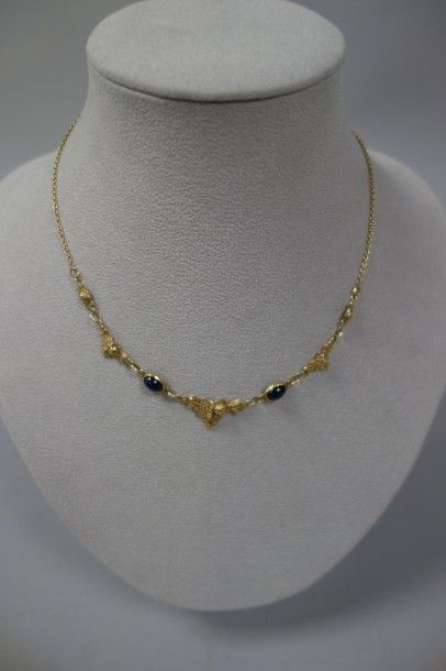 Collier draperie en or jaune (750) formé...