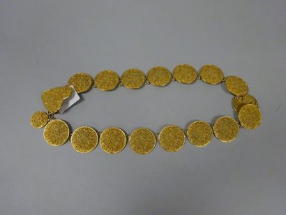 Yves Saint LAURENT
Ceinture en métal doré...