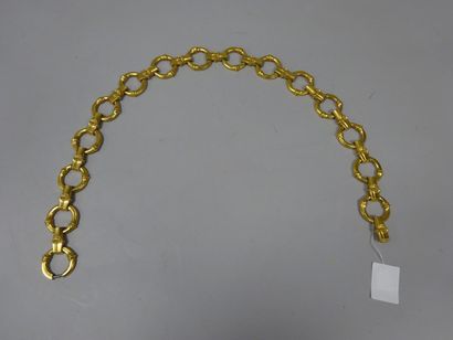 Yves Saint LAURENT
Ceinture en métal doré...