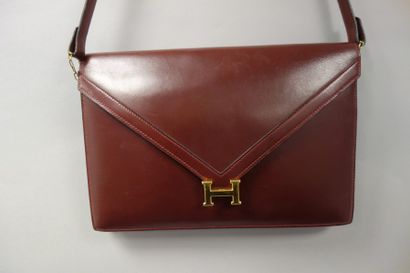 HERMES Paris
Made in France 

Pochette modèle...