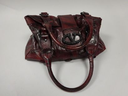 Giovanni VALENTINO
Sac en cuir bordeaux et...
