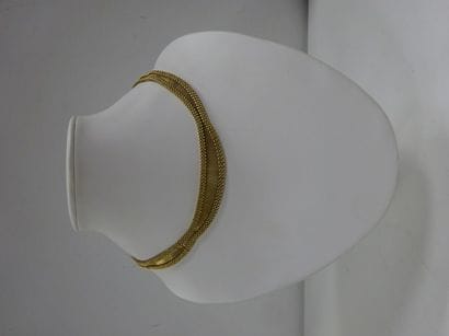 Collier ras de cou en or jaune (750) à décor...