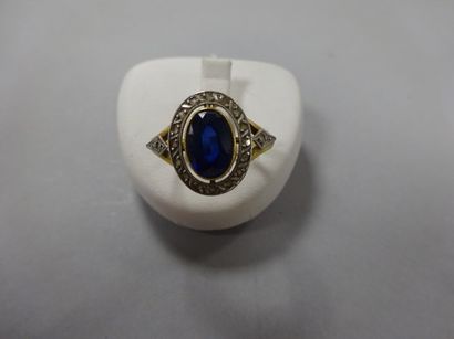 Bague en or jaune et blanc (750) ornée d'un...