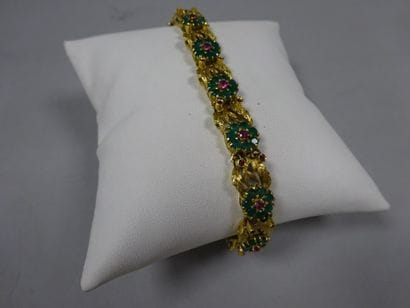Bracelet articulé en or jaune (750) à motifs...