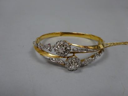 Bracelet jonc ouvrant en or jaune et gris...