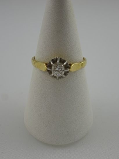 Bague solitaire en ors jaune et gris (750)...