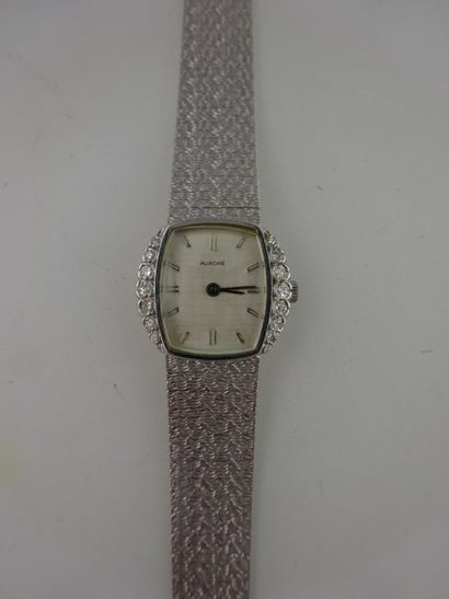 AURORE 
Montre bracelet de dame en or gris...