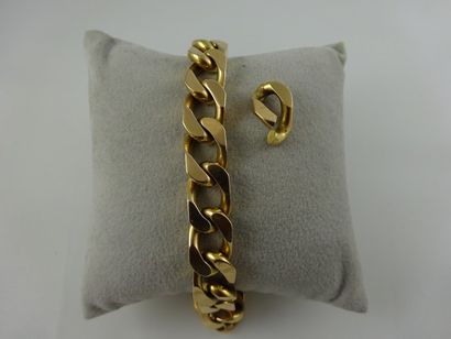 Bracelet gourmette en or jaune (750). 

On...