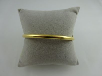 Bracelet jonc ouvrant en or jaune (750)....