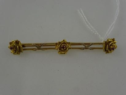Broche barrette en or jaune (750) à décor...