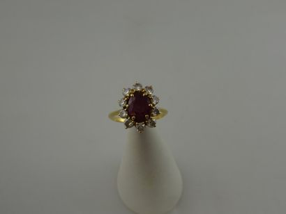 Bague marguerite en or jaune (750) ornée...