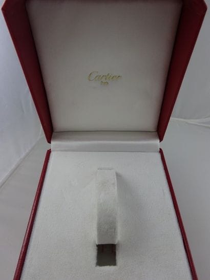 Ecrin de montre Cartier en cuir rouge à frise...