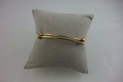 Bracelet en or jaune (750) coulissant. 

Poids:...