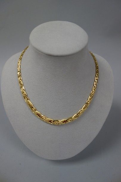 Collier à maille tressée en or jaune (750)...