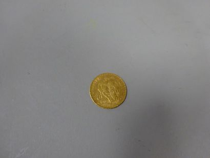 FRANCE 

Une pièce de 20 francs en or jaune,...