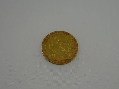 FRANCE

Une pièce de 20 francs en or jaune....