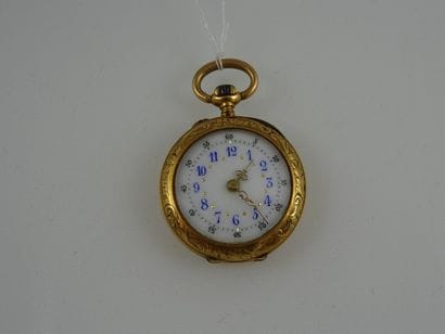 Montre de col en or jaune (750). 

Le cache...