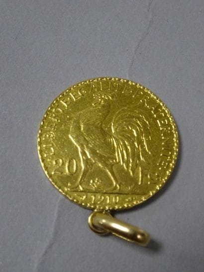 Pendentif monture en or jaune (750) retenant...