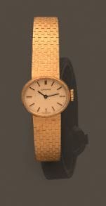 LONGINES
Montre bracelet de dame en or jaune...
