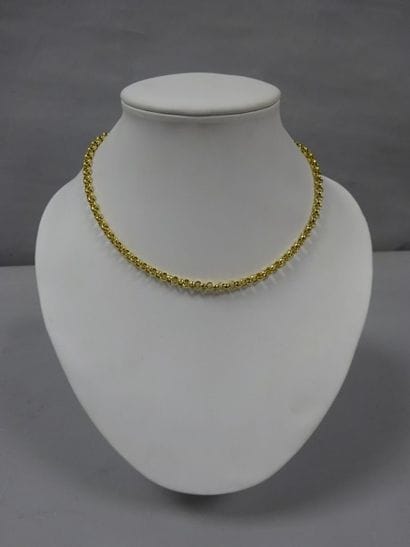 Collier en or jaune (750) à maille haricot....