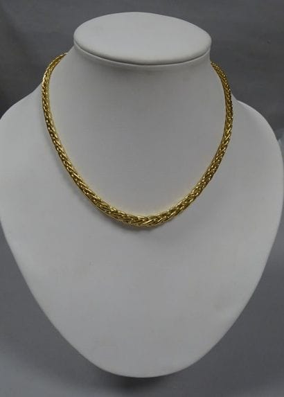 Collier en or jaune (750) à maille palmier....