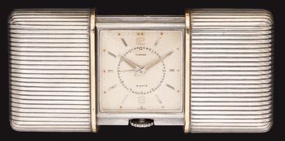 CARTIER Rare pendulette de voyage réveil...
