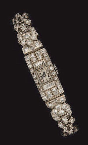 MONTRE BRACELET de dame en platine et or...