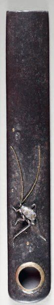 Kozuka en fer à décor incrusté de shibuichi...