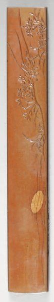 Kozuka en suaka à décor gravé et incrusté...