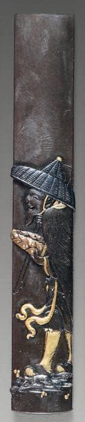 Kozuka en sentoku décoré en relief et incrusté...