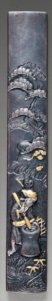 Kozuka en shibuichi à décor incrusté de cuivre...