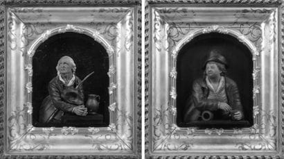 Deux hauts reliefs en cire polychrome formant...