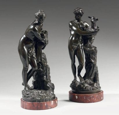 Deux sculptures en bronze à patine brun-vert...