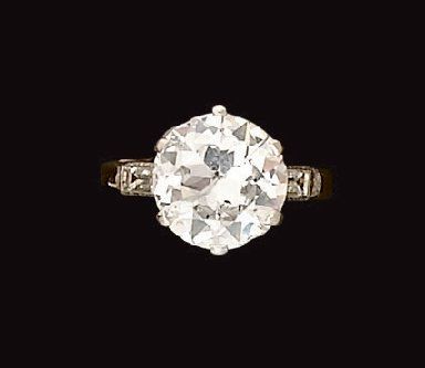 Bague en or gris et platine, le chaton à...