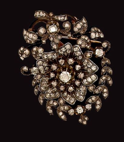 Broche pendentif en or et argent figurant...