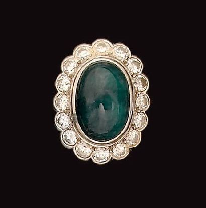 Bague en or et platine, ornée d'une émeraude...