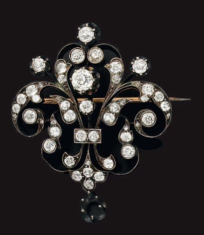Broche en argent et or jaune à décor fleurdelisé...