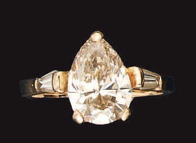 Bague en or jaune, sertie d'un diamant de...