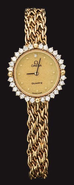 OMEGA
Montre bracelet de dame en or, cadran...