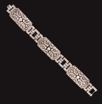 Bracelet articulé en or gris ajouré, pavé...
