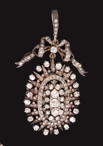 Pendentif en or et argent, serti de diamants...