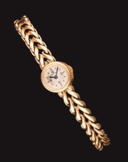 CARTIER
Montre-bracelet de dame, en or jaune,...