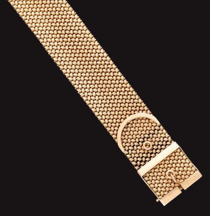 Bracelet large et souple en or jaune tressé,...