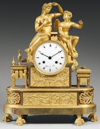 Pendule en bronze ciselé et doré au mat et...