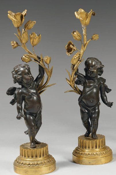 Paire de flambeaux en bronze doré et bronze...