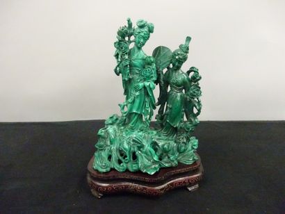 CHINE

Groupe sculpté en malachite représentant...