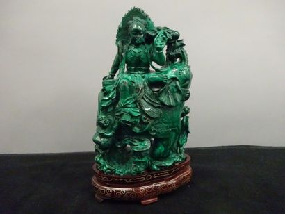 CHINE

Groupe en malachite sculptée représentant...