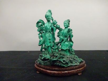 CHINE

Groupe sculpté en malachite représentant...