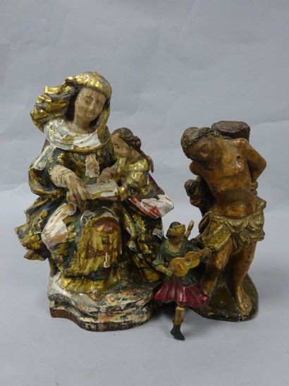 Lot comprenant :

- Statuette en terre cuite...