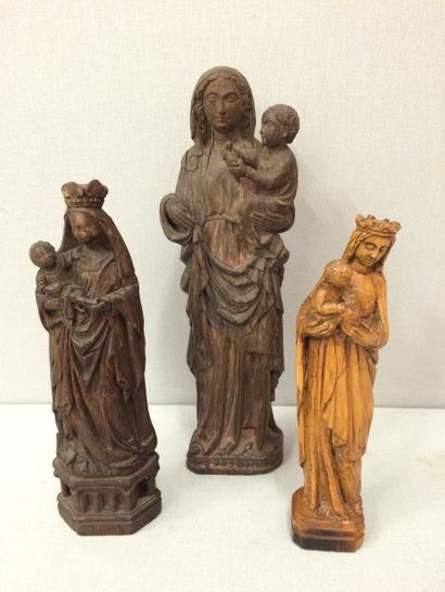 Vierge à l'Enfant.

Ensemble de trois sculptures...